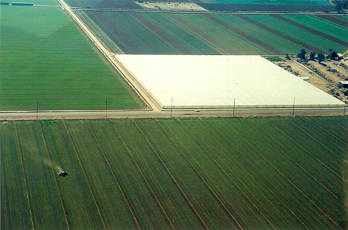 Organic Crop Protection with 16 acres Insect Screen Structure.