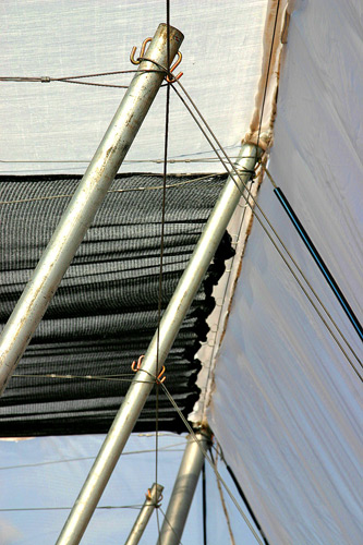 Detail - Exterior Post with Overhead Trellis, Retractable Shade and fixed Screen.
